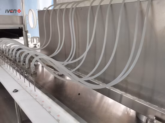 Máquina de llenado, taponado y taponado de viales inyectables